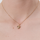 Şener Besim Heart Locket Charm worn as a necklace pendant