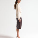 high neck relaxed fit blouse in cream on model by sener besim