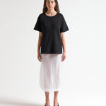 heavy weight knitted tee in black on model by sener besm