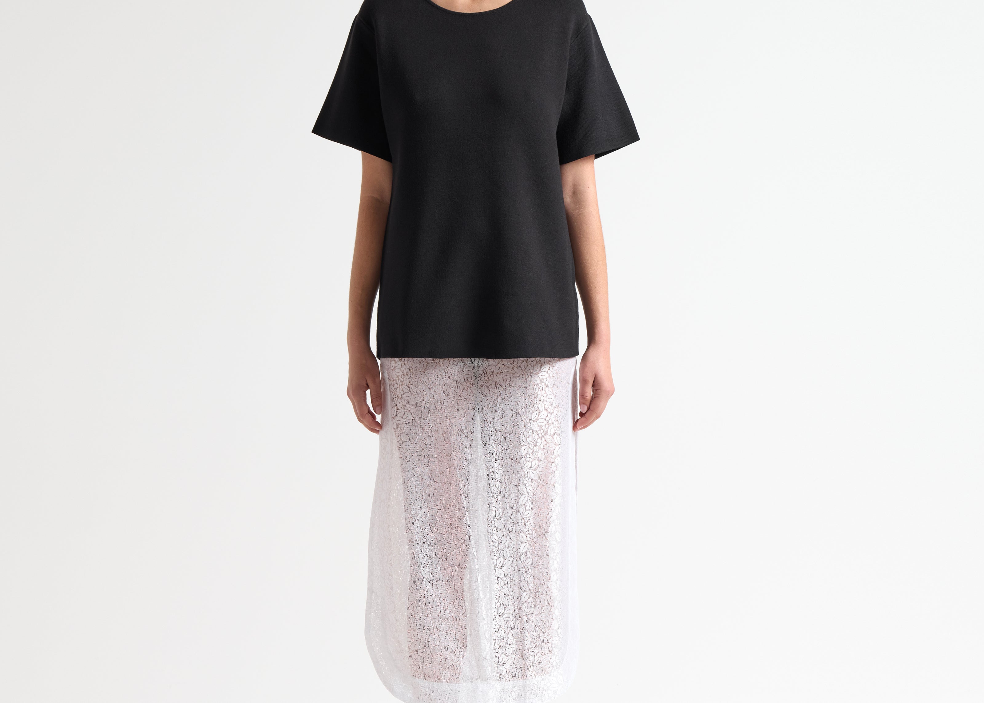 heavy weight knitted tee in black on model by sener besm