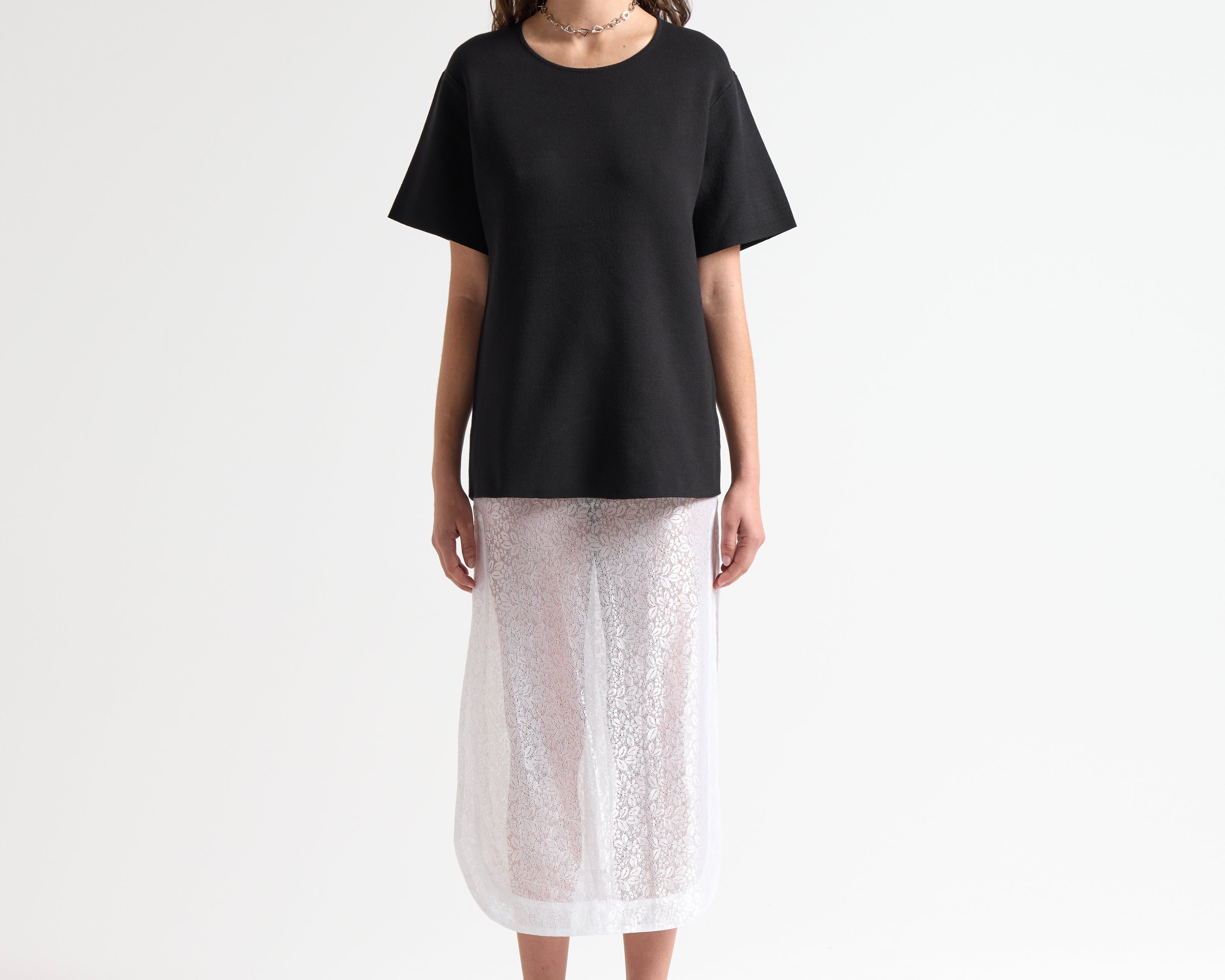 heavy weight knitted tee in black on model by sener besm