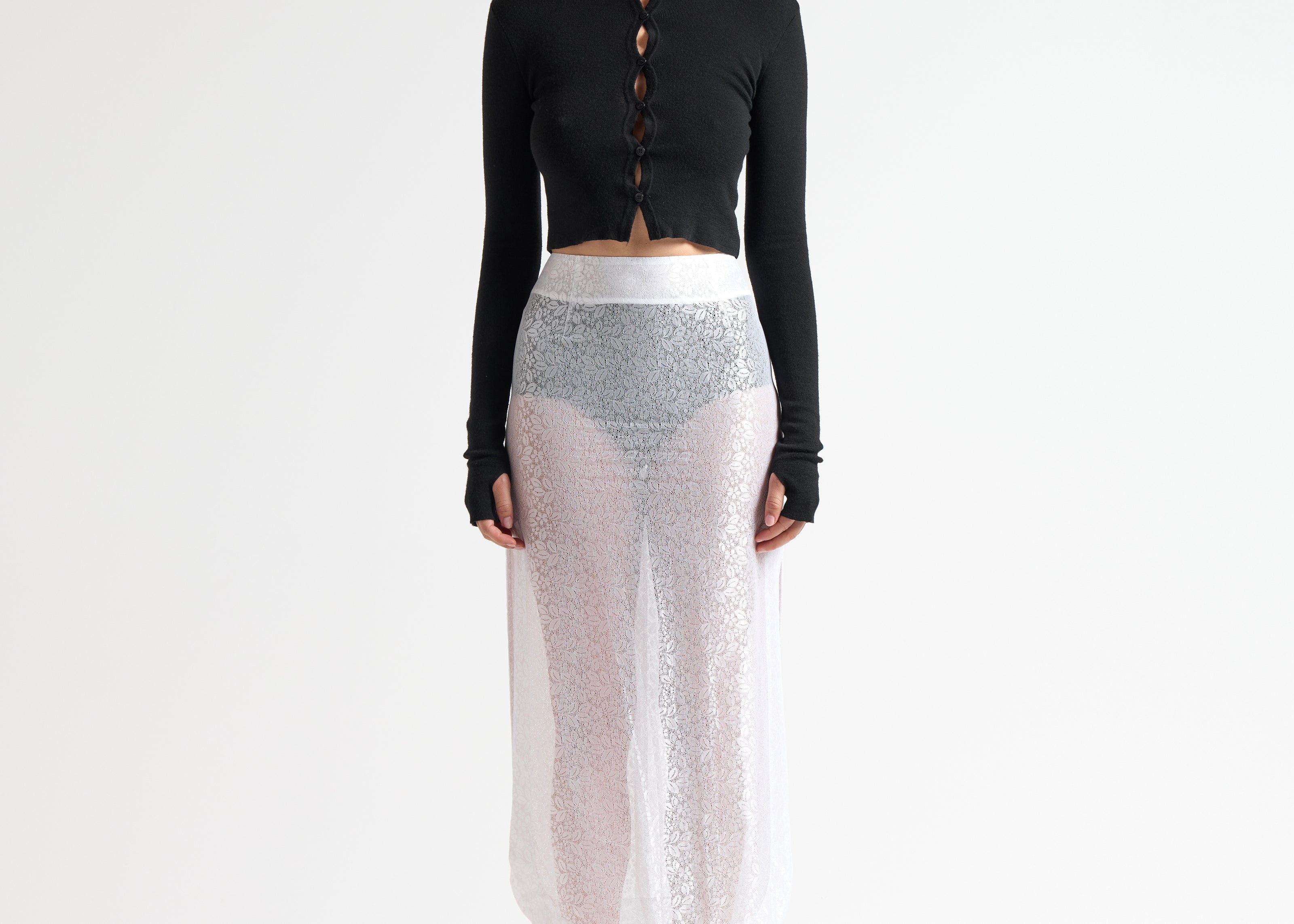 model wearing sener besim long lace detail skirt in white 