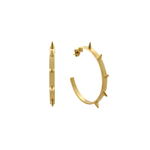 A pair of gold hoop earrings with spike details, crafted from 14k gold vermeil on a sterling silver base, displayed against a white background.