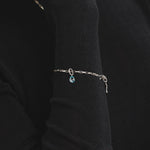 Sener Besim Blue Teardrop Charm Worn