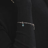 Sener Besim Blue Teardrop Charm Worn