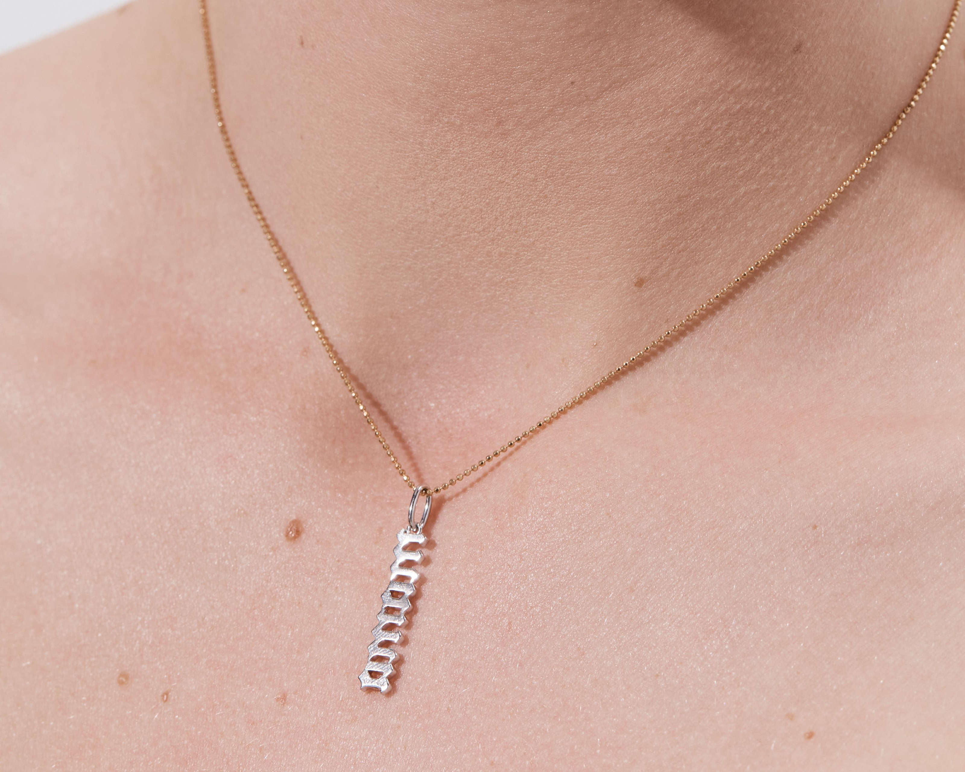 Şener Besim Mama Gothic Charm worn on necklace — sterling silver