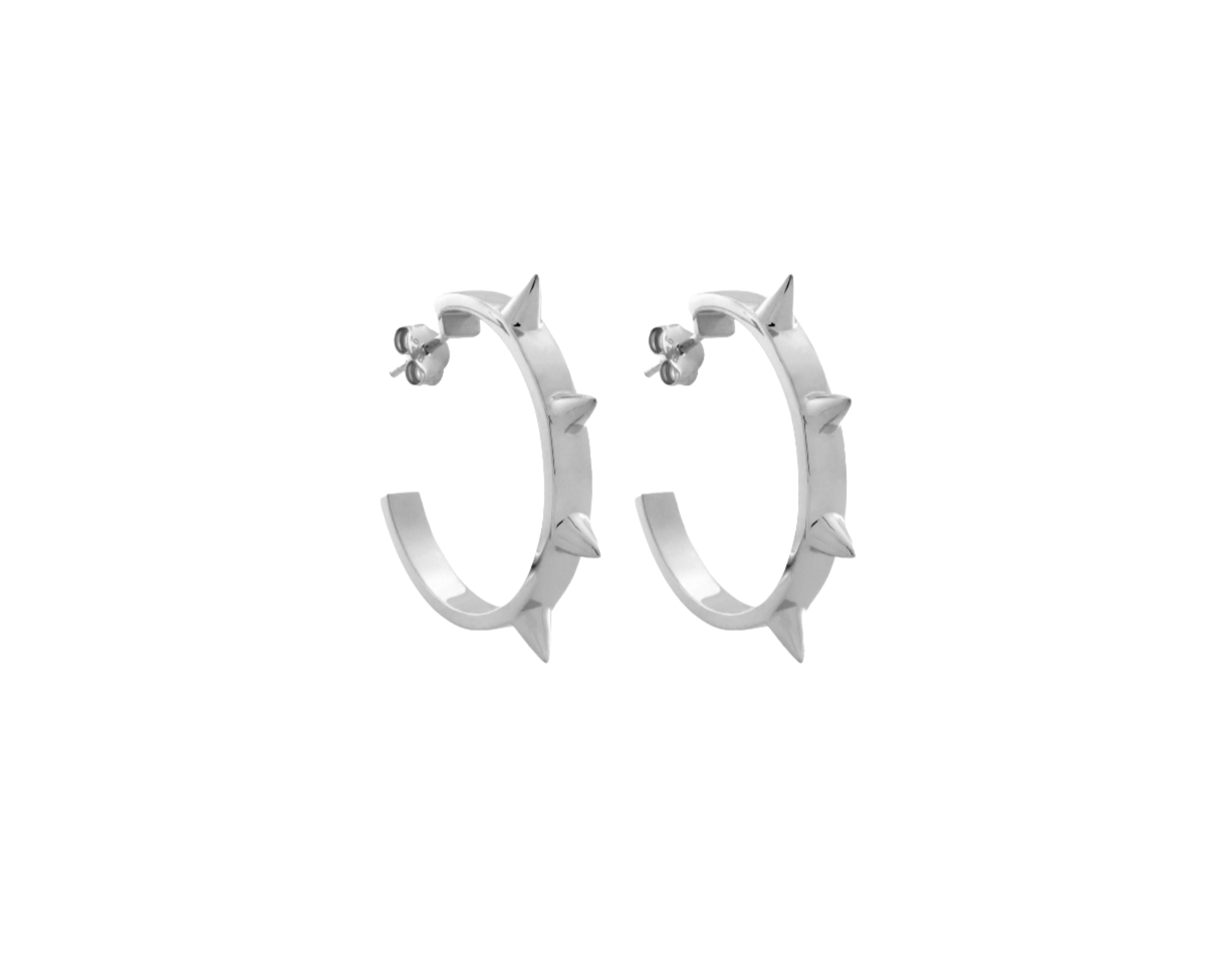 A pair of sterling silver hoop earrings with spike details, photographed on a white background.