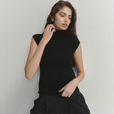 Şener Besim Merino Cap Sleeve Top in Black, close-up styling detail