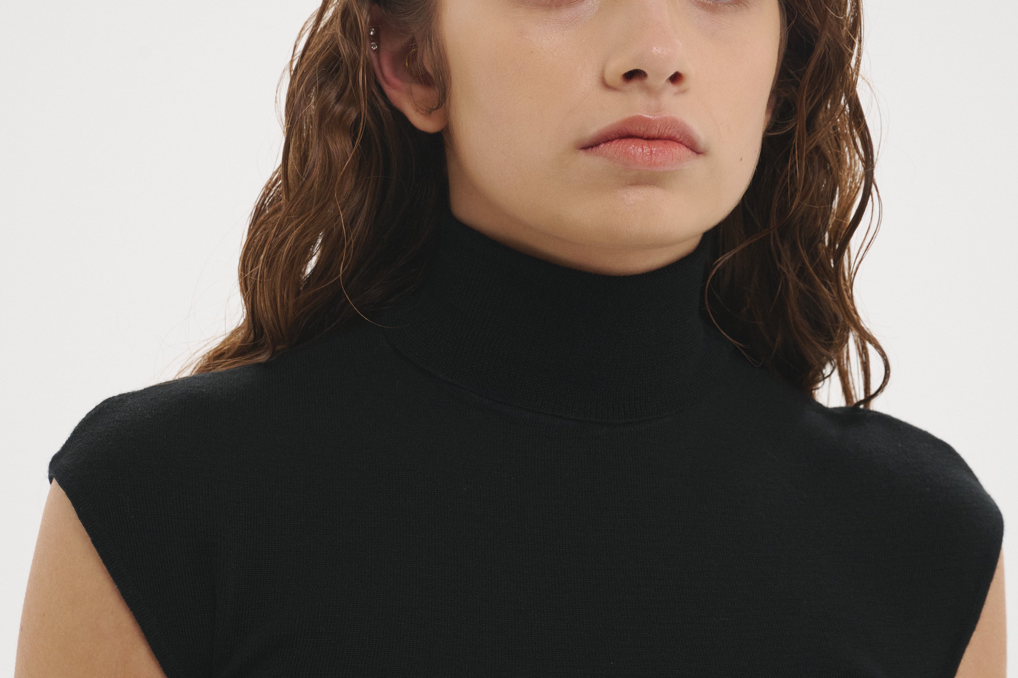 Şener Besim Merino Cap Sleeve Top in Black worn close-fitted, front view