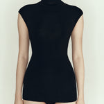 Black merino cap sleeve turtleneck top, front view — Şener Besim