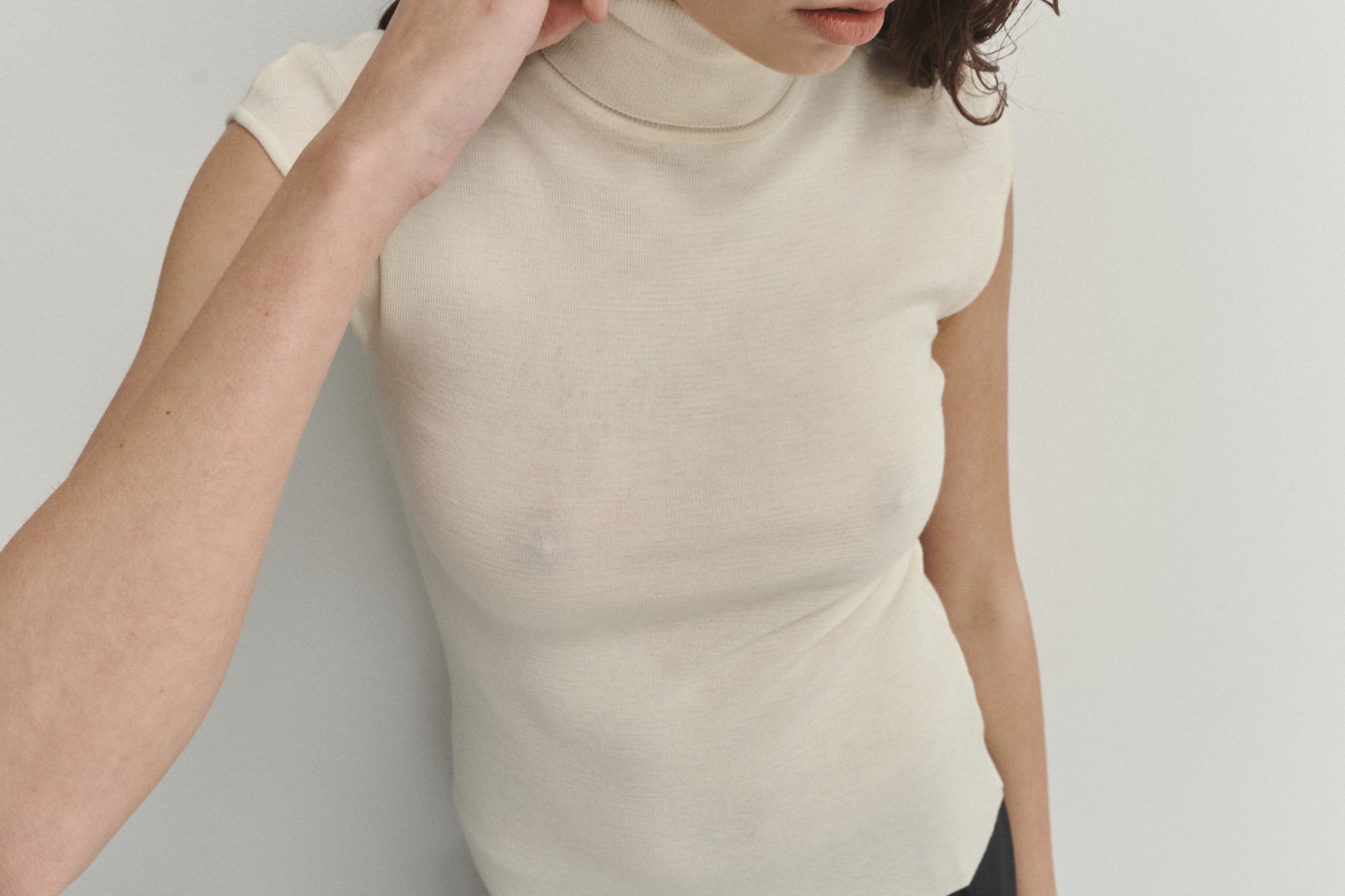 Şener Besim Merino Cap Sleeve Top in White, close-up styling detail