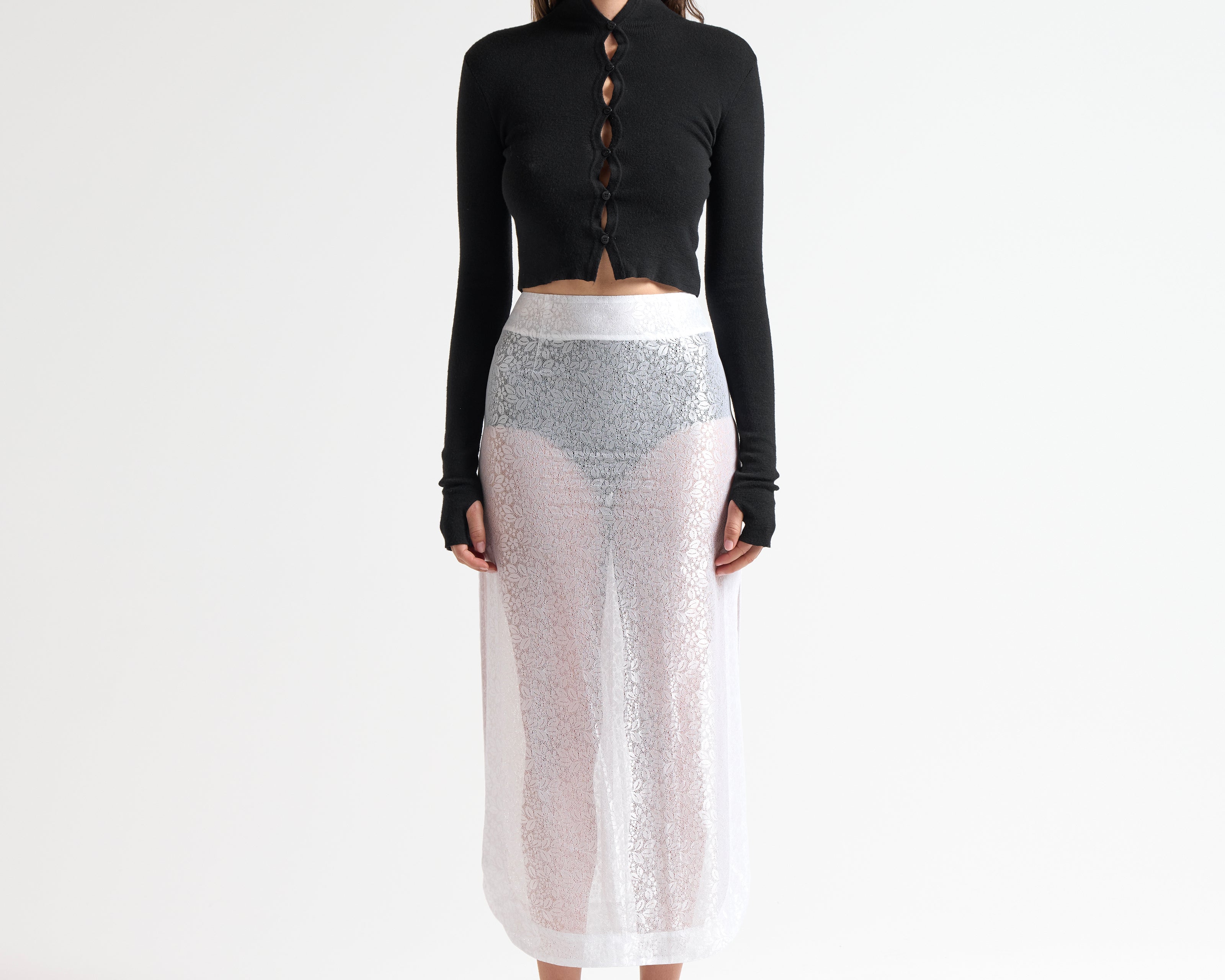 Black merino multibutton cropped cardigan, front view — Şener Besim