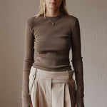 Şener Besim Merino Thumbhole Crewneck in putty, worn