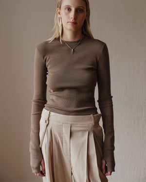 Şener Besim Merino Thumbhole Crewneck in putty, worn