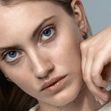 Şener Besim Mosaic Huggies gold worn on model — Mosaic Series