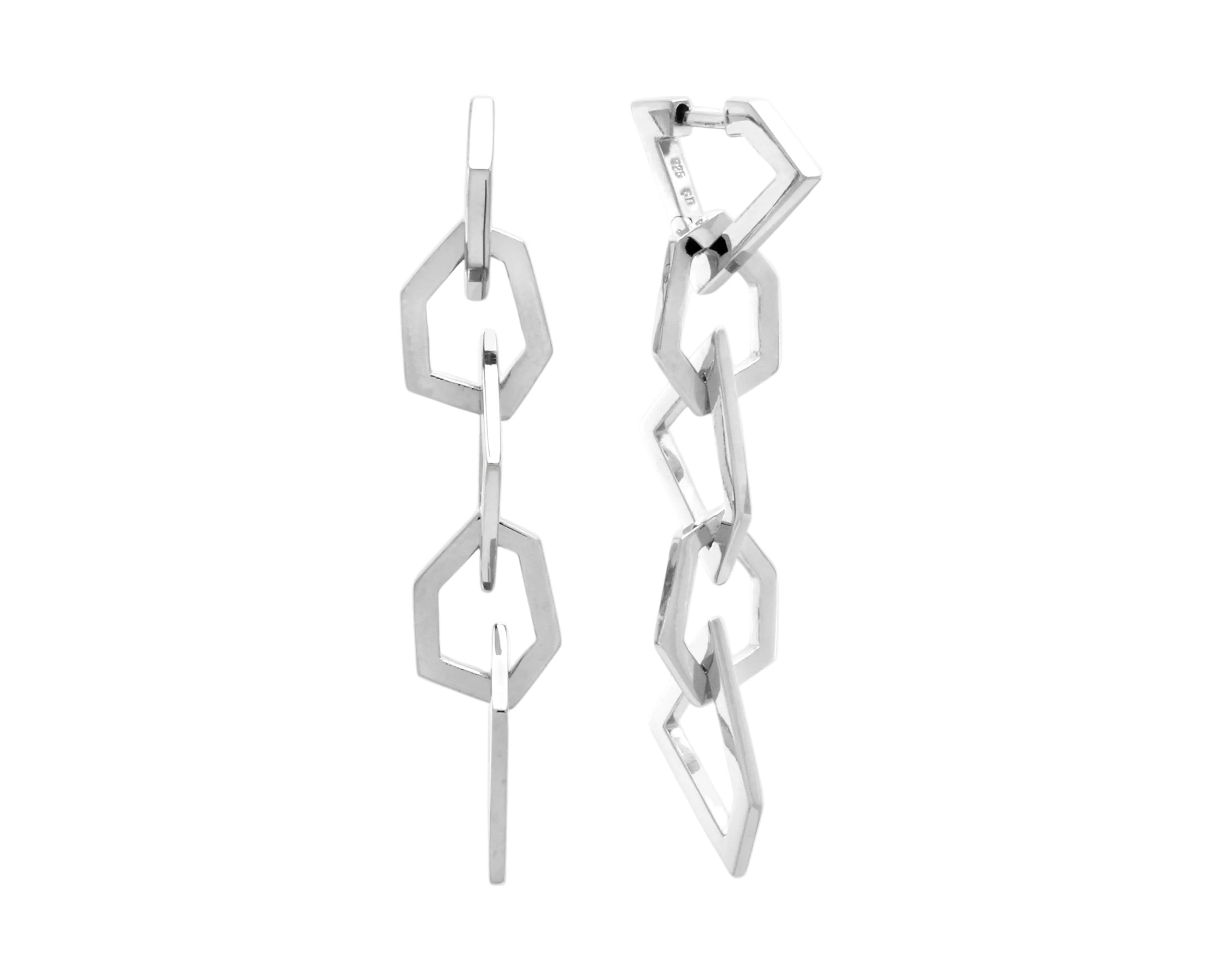 Şener Besim Mosaic Long Earring in rhodium plating, five geometric chain links, flat lay