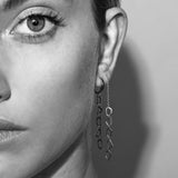 model in sener besim thread mosaic earrings