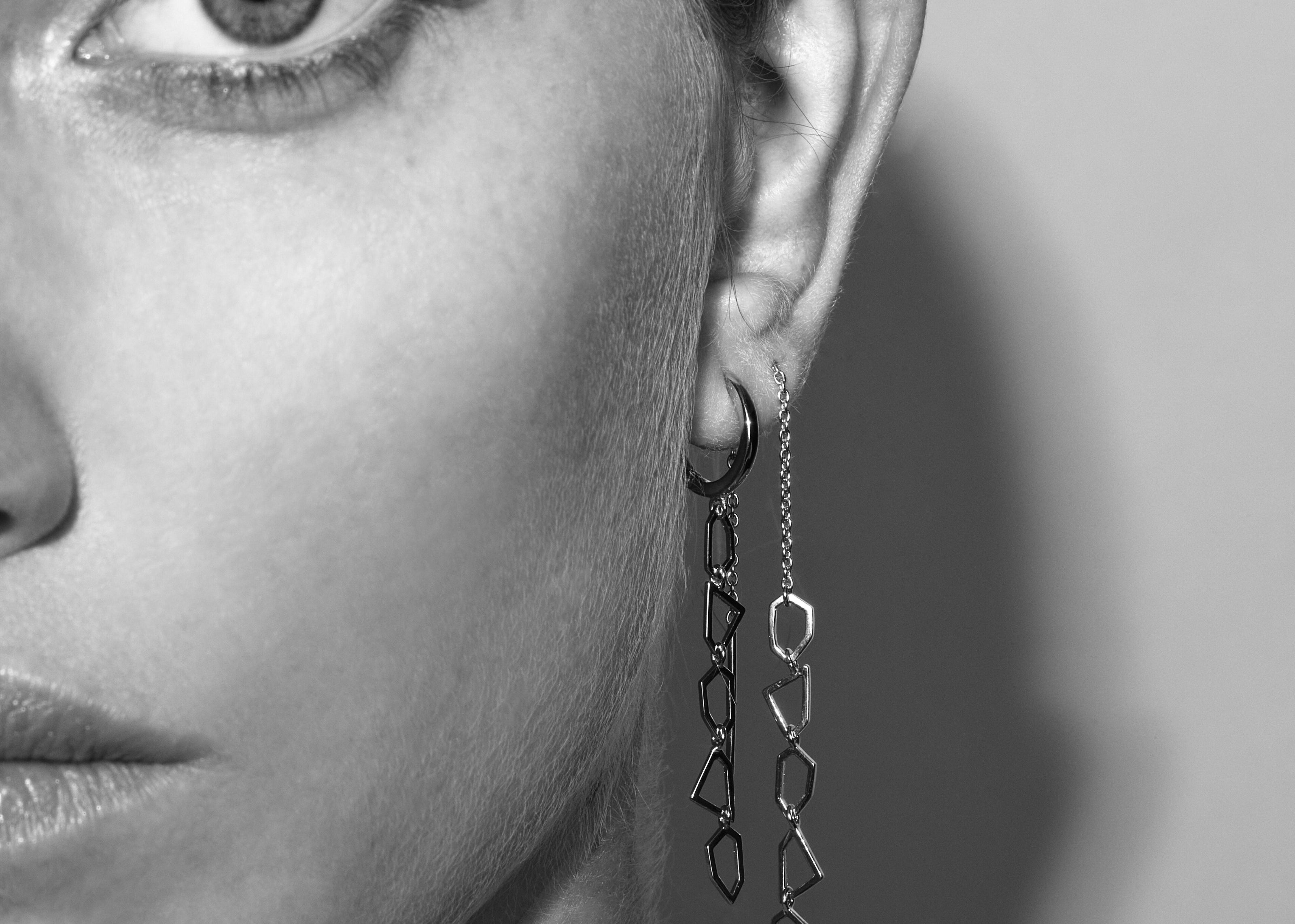 model in sener besim thread mosaic earrings