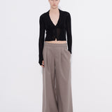 Black chiffon cardi styled with wide leg trousers — Şener Besim