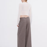 Off white chiffon cardigan back view styled with wide leg trousers — Şener Besim