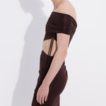 Şener Besim burgundy maxi dress side profile — floor sweeping silhouette