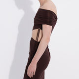 Şener Besim burgundy maxi dress side profile — floor sweeping silhouette