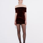 Şener Besim Off Shoulder Mini Dress in burgundy velvet, worn front view