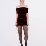 Şener Besim Off Shoulder Mini Dress in burgundy velvet, worn front view