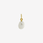Pearl charm gold plating on white background — Şener Besim