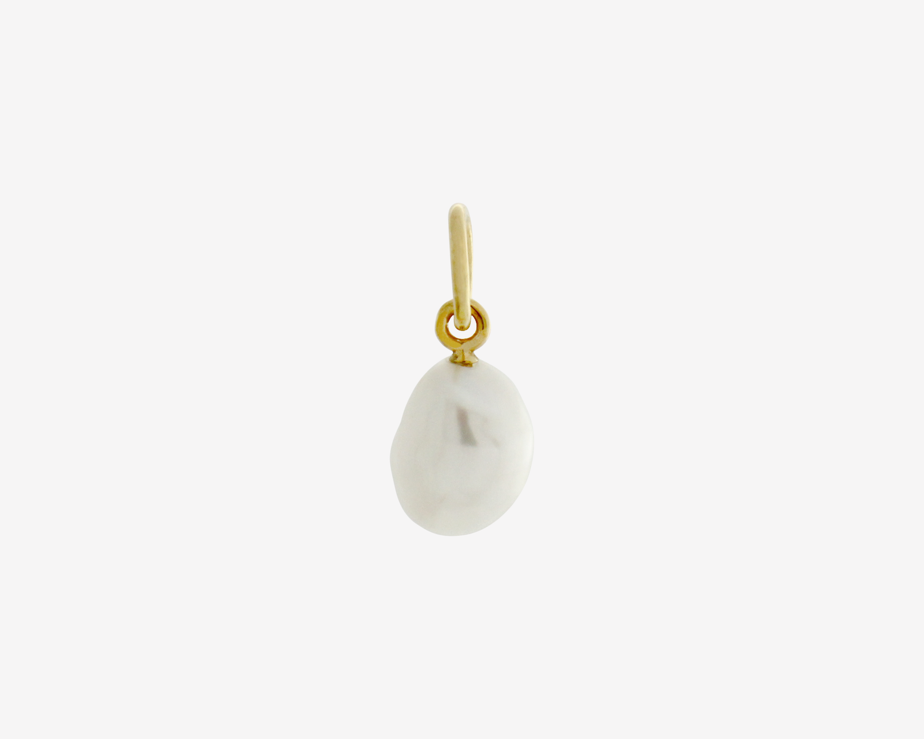 Pearl charm gold plating on white background — Şener Besim
