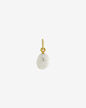 Pearl charm gold plating on white background — Şener Besim
