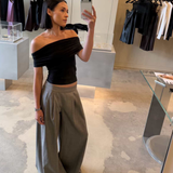 Black stretch off shoulder top with ruched neckline by sener besim