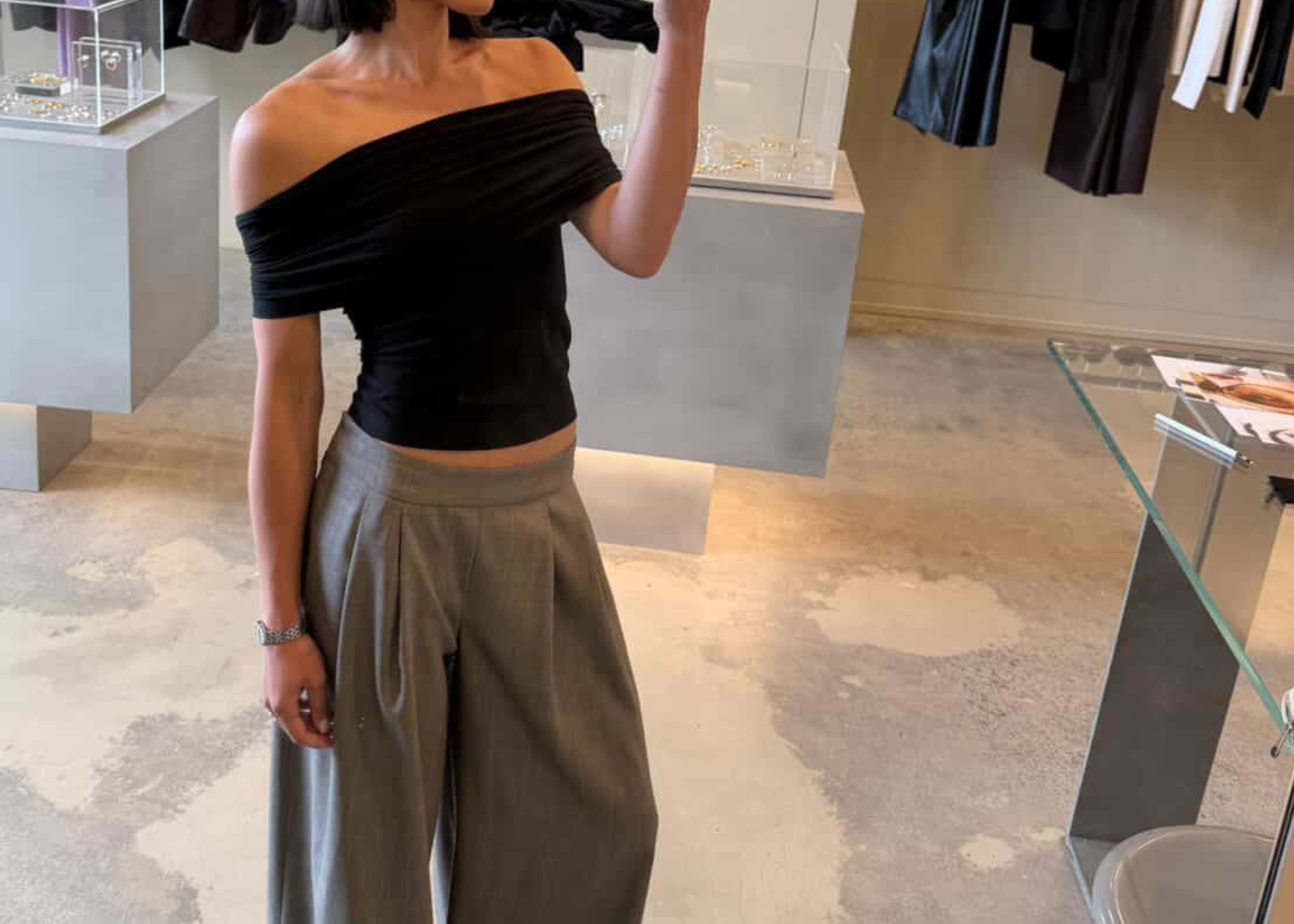 Black stretch off shoulder top with ruched neckline by sener besim