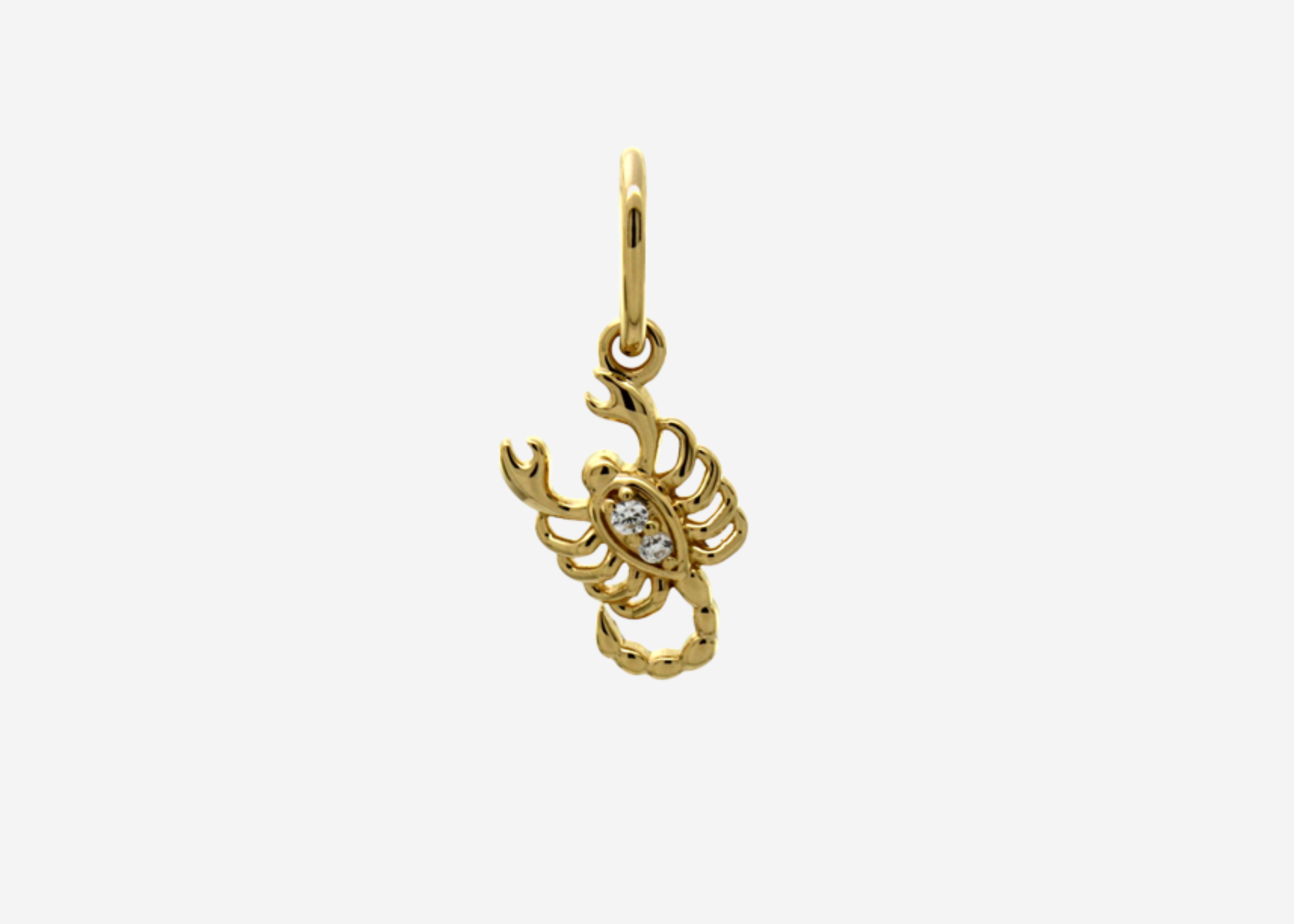 Şener Besim Scorpion Charm in sterling silver with 14ct gold plating and white stones