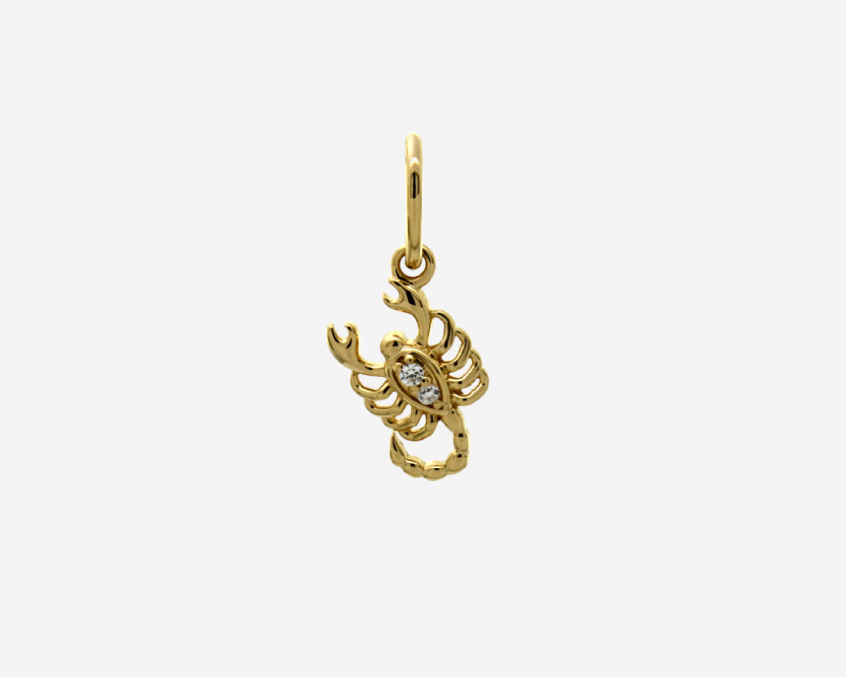 Şener Besim Scorpion Charm in sterling silver with 14ct gold plating and white stones