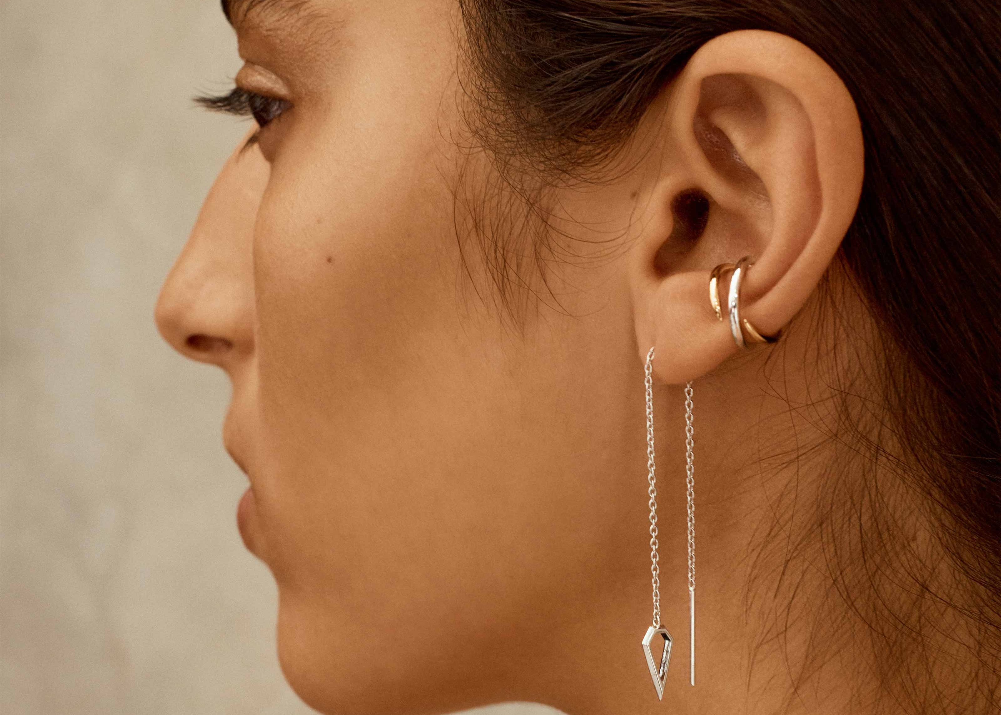 Spear Thread Earrings in Silver on model Şener Besim