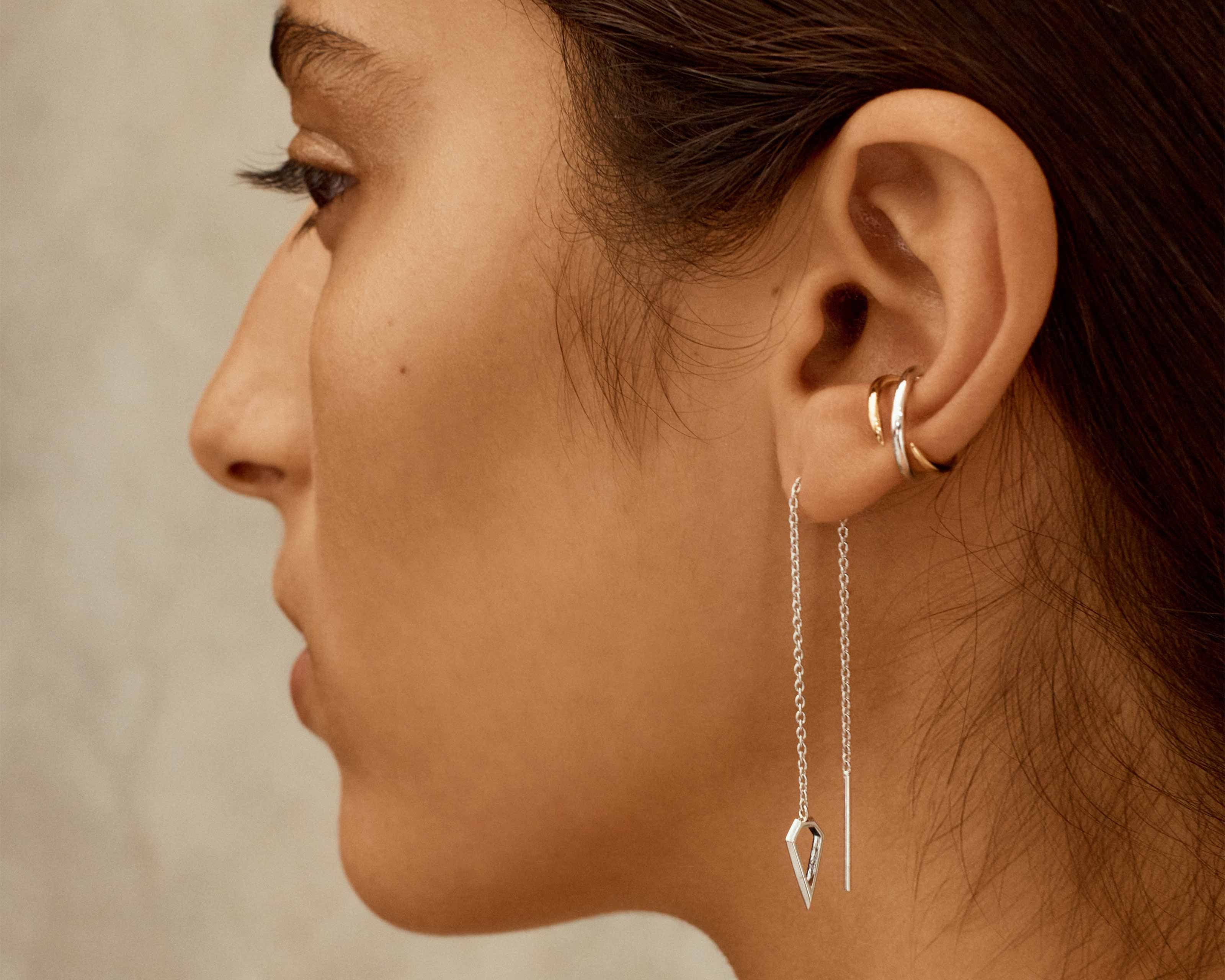 Spear Thread Earrings in Silver on model Şener Besim