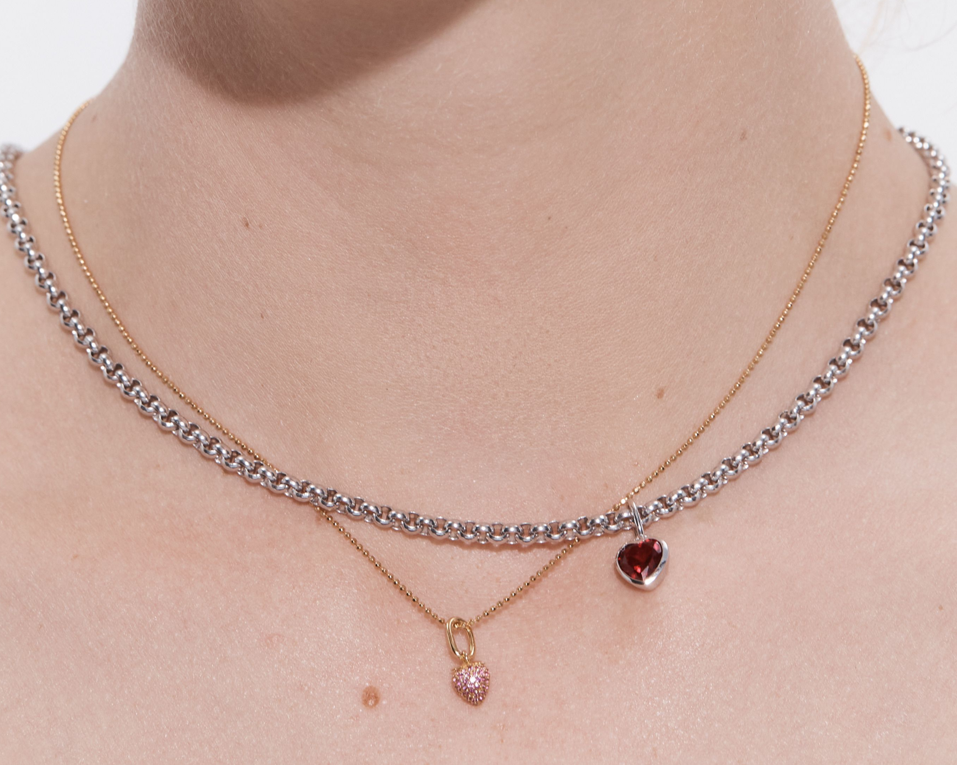 Şener Besim Strawberry Charm worn on necklace — sterling silver