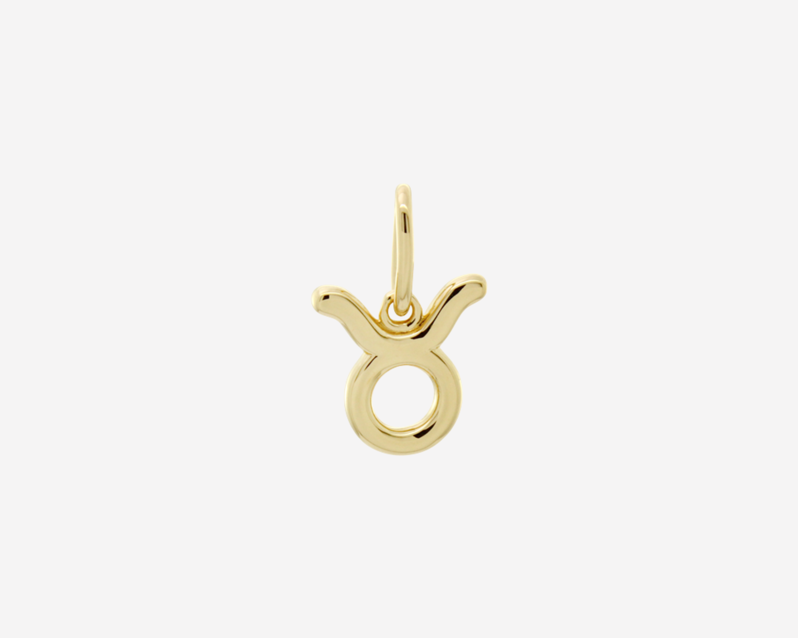 Şener Besim Taurus Charm in 14ct gold plating, flat lay