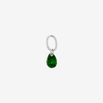Şener Besim Teardrop Charm with emerald cubic zirconia in rhodium plating, flat lay