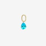 Teardrop Charm Light Blue Gold by Şener Besim in sterling silver with 14ct gold plating, set with a faceted light blue cubic zirconia