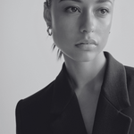 sener besim thick statement earrings on model