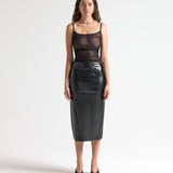 Model wearing a black sheer camisole top by sener besim