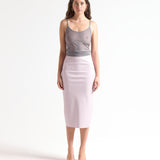 model wearing a grey sheer tank top with thin straps by sener besim