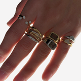 Close up Şener Besim Unisex Gem Ring in rhodium plating with smoky quartz stacked on hand— Silver