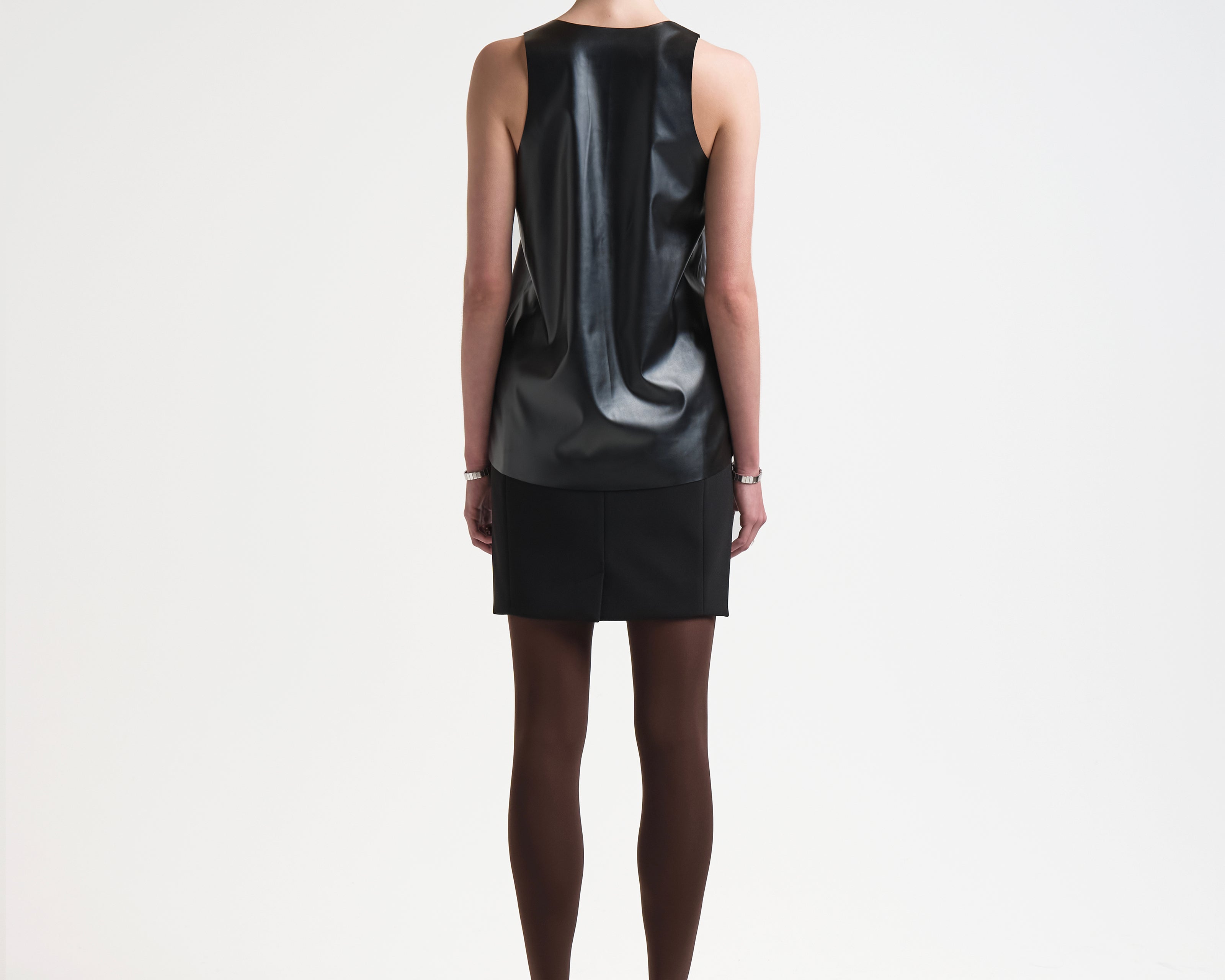 relaxed vegan leather tank top sleeveless on model sener besim