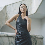 Black vegan leather halter neck mini dress with ruched detail — Şener Besim