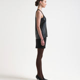 vegan leather tank top by sener besim on model side view