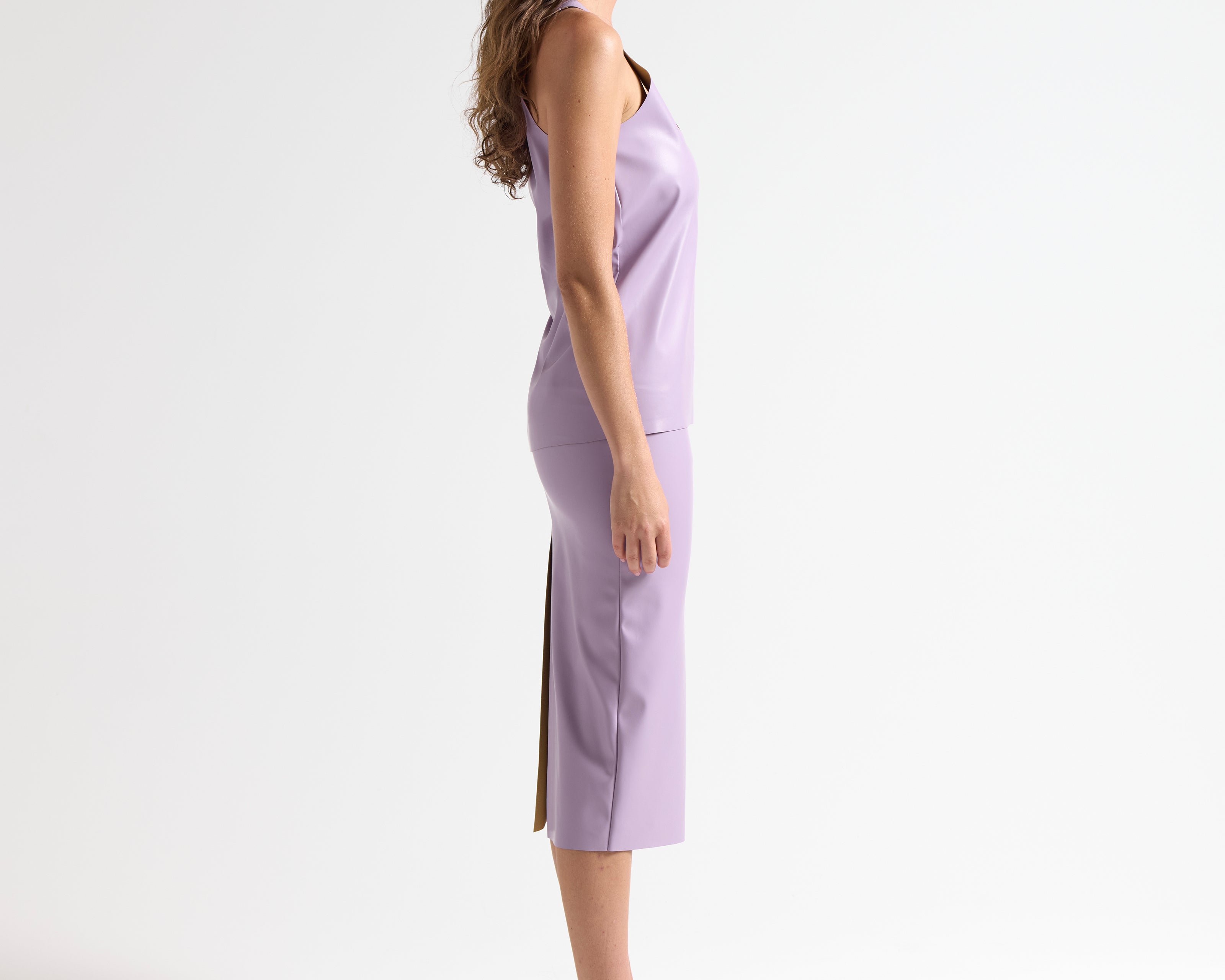 vegan leather violet tank top on model by sener besim side view