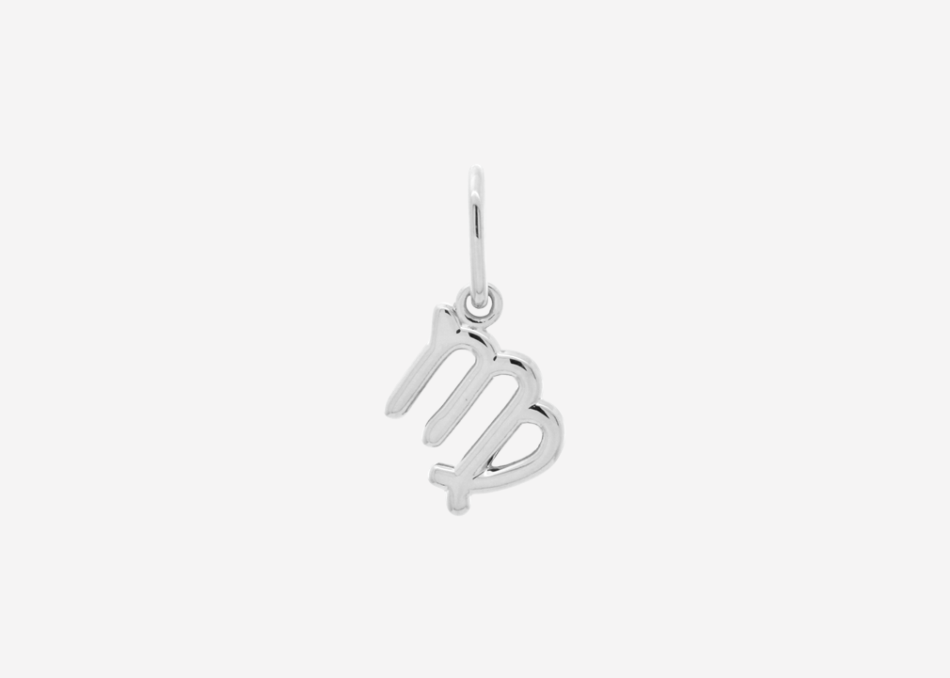 Şener Besim Virgo Charm in silver rhodium plating, flat lay